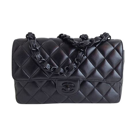 chanel black pouch|Chanel pouch with chain.